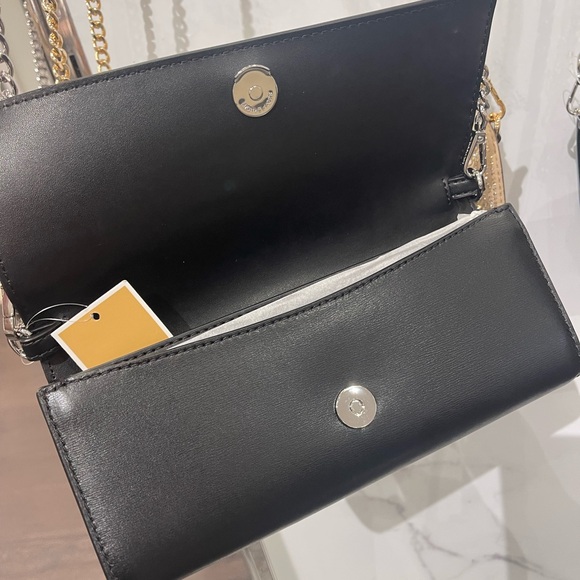 MICHAEL KORS Jet Set Medium Embellished Metallic Leather Clutch Crossbody
Black - Picture 10 of 16